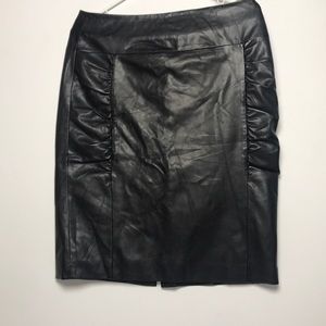 Synthetic leather skirt. Midi length.